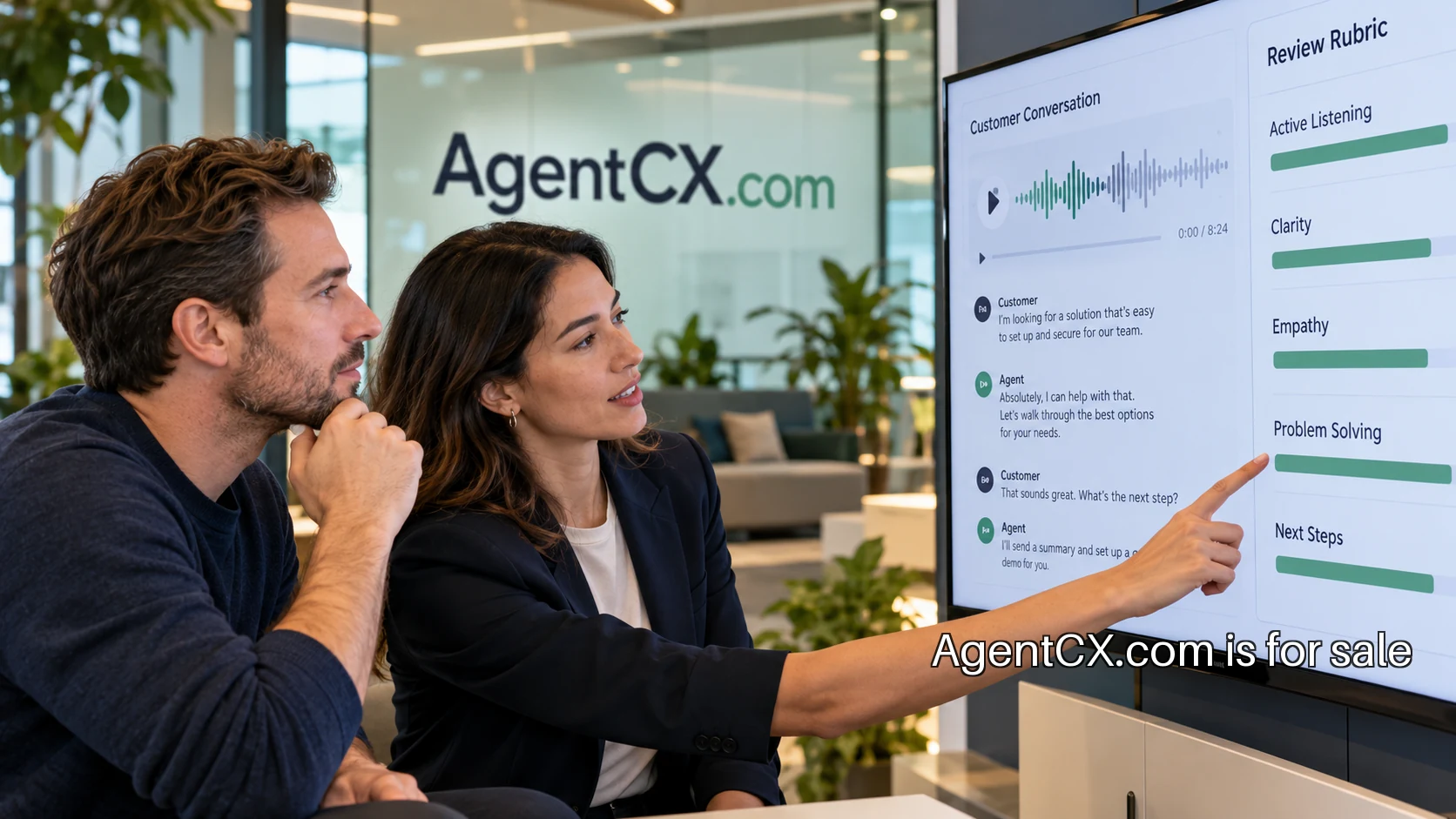 A supervisor and agent reviewing conversation quality
